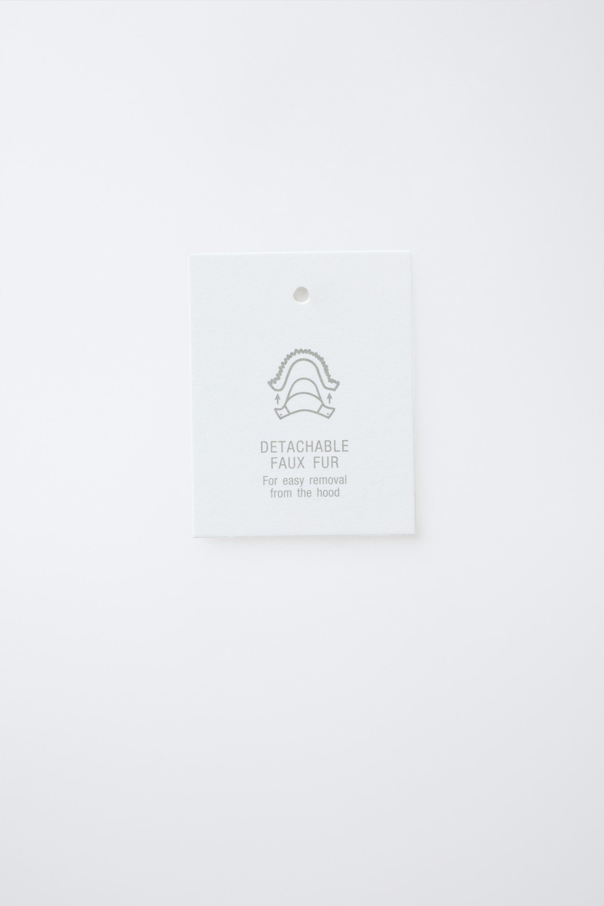 DOUDOUNE EN PLUME ET DUVET DÉPERLANTE AVEC CAPUCHE EFFET FOURRURE AMOVIBLE